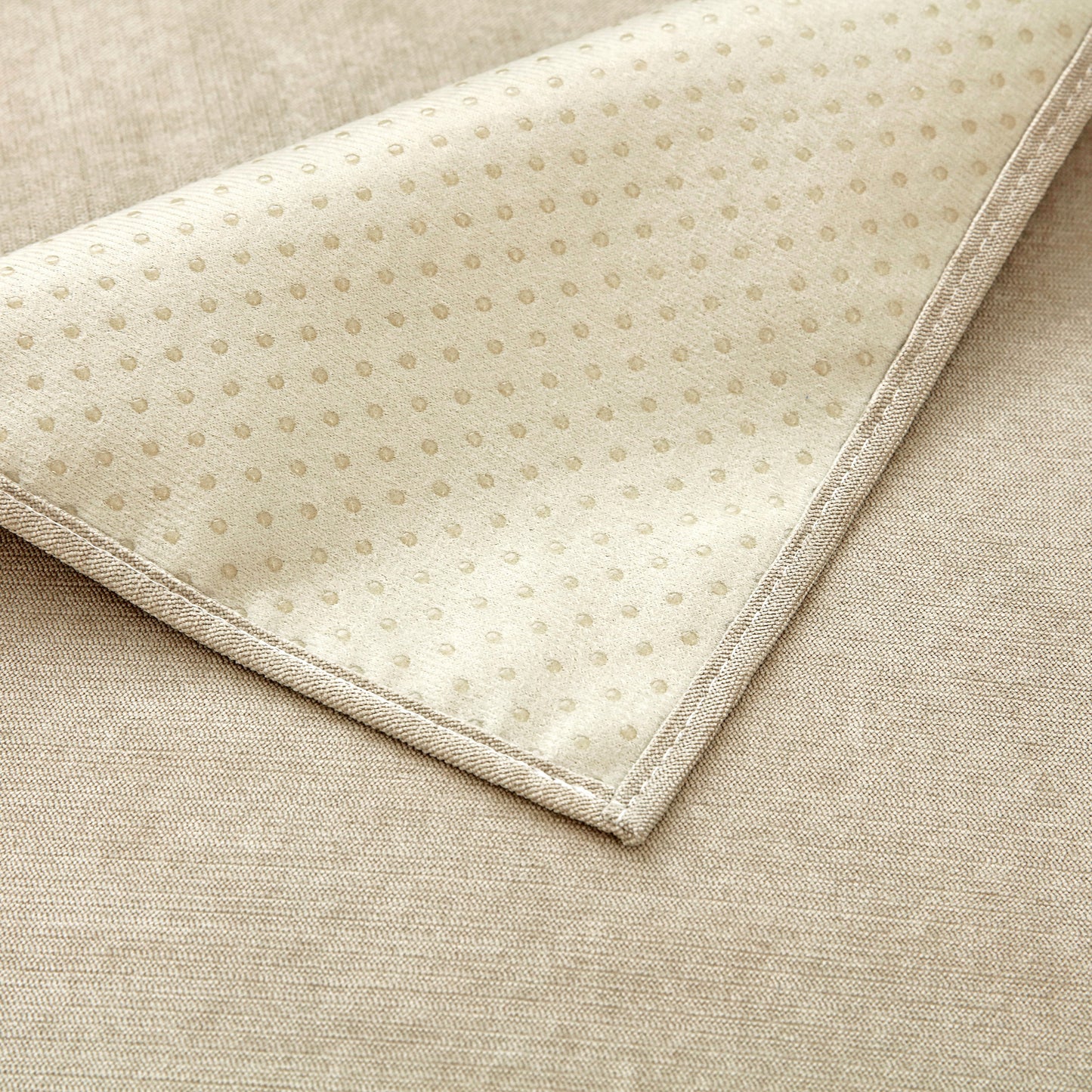 Close-up of Waterproof Non-Slip Quilted Corduroy Sofa Covers for Pets, Sectional Couch Covers showing fabric texture and pattern.