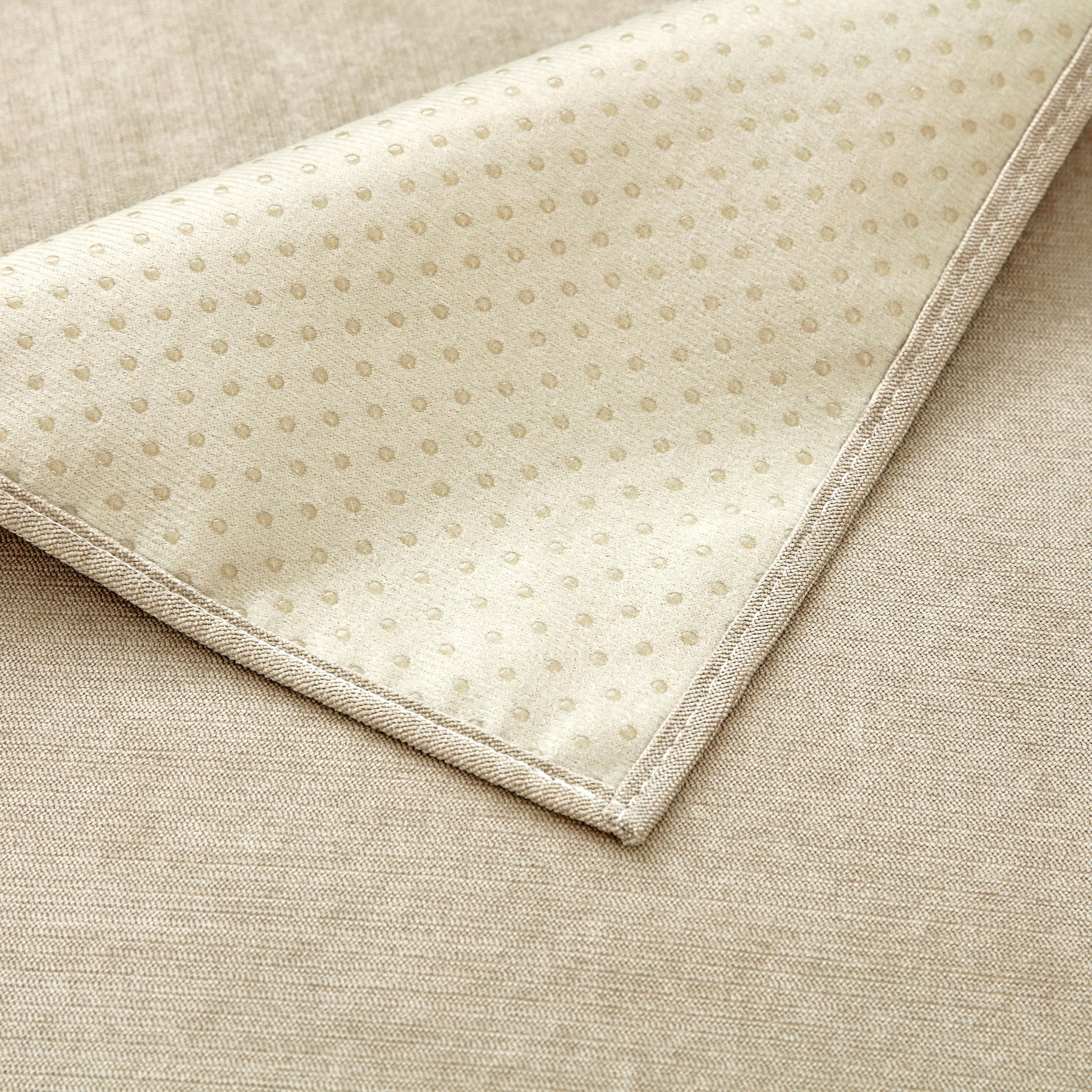 Close-up of Waterproof Non-Slip Quilted Corduroy Sofa Covers for Pets, Sectional Couch Covers showing fabric texture and pattern.
