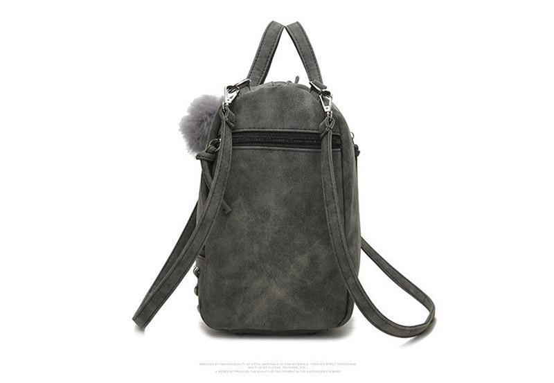 Back view of Rustic Charm Leather Shoulder Bag – Stylish Cowgirl Handbag in grey, showcasing versatile straps and durable leather design.