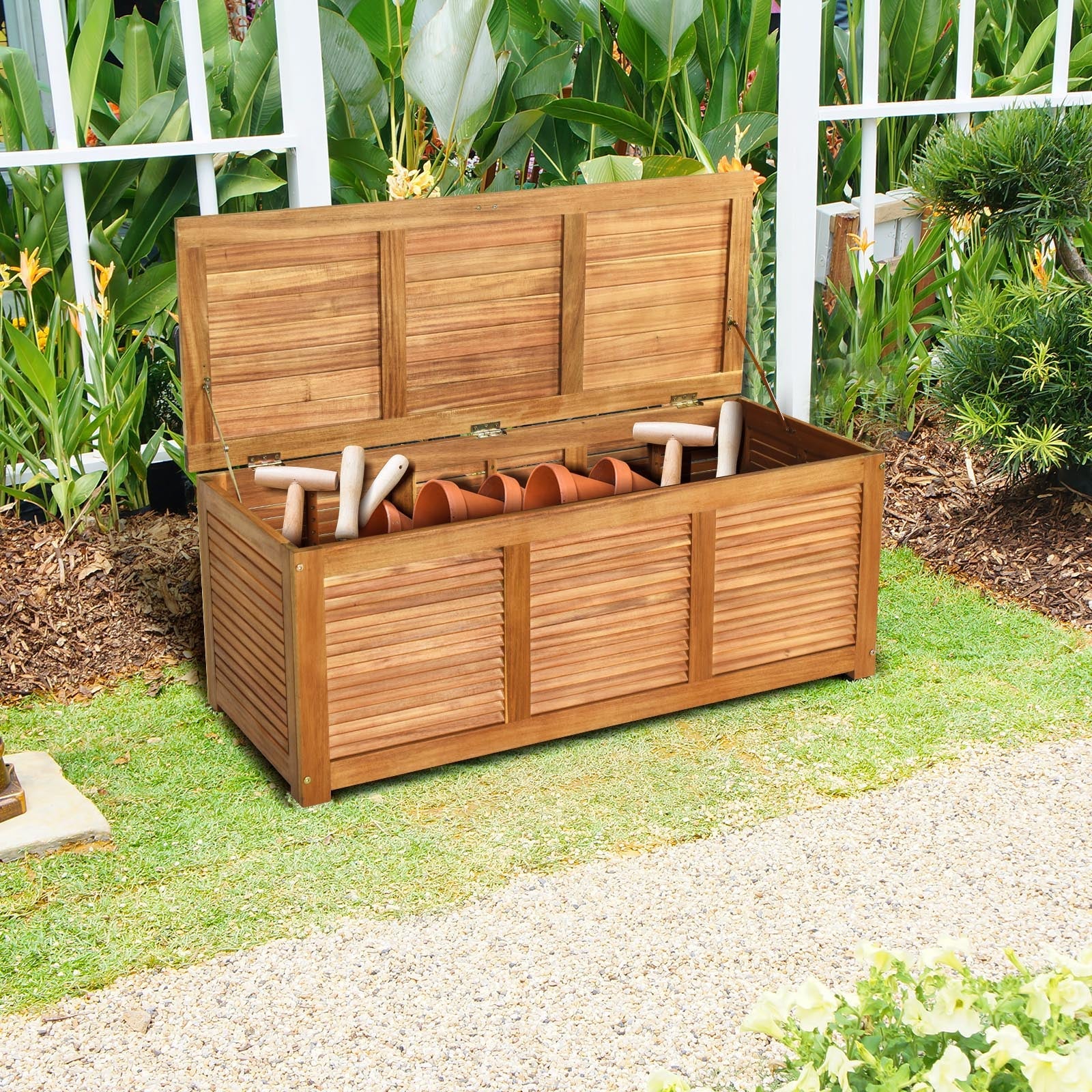 46 Gallon Acacia Wood Storage Bench Box for Patio Garden Deck with gardening tools inside, open lid, and sturdy wooden frame.
