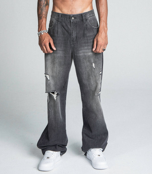 AJ09B-2 BLACK DISTRESSED BAGGY JEANS with five-pocket design, mid-rise, loose-fit, zipper fly, and faded details. Made from cotton fabric.