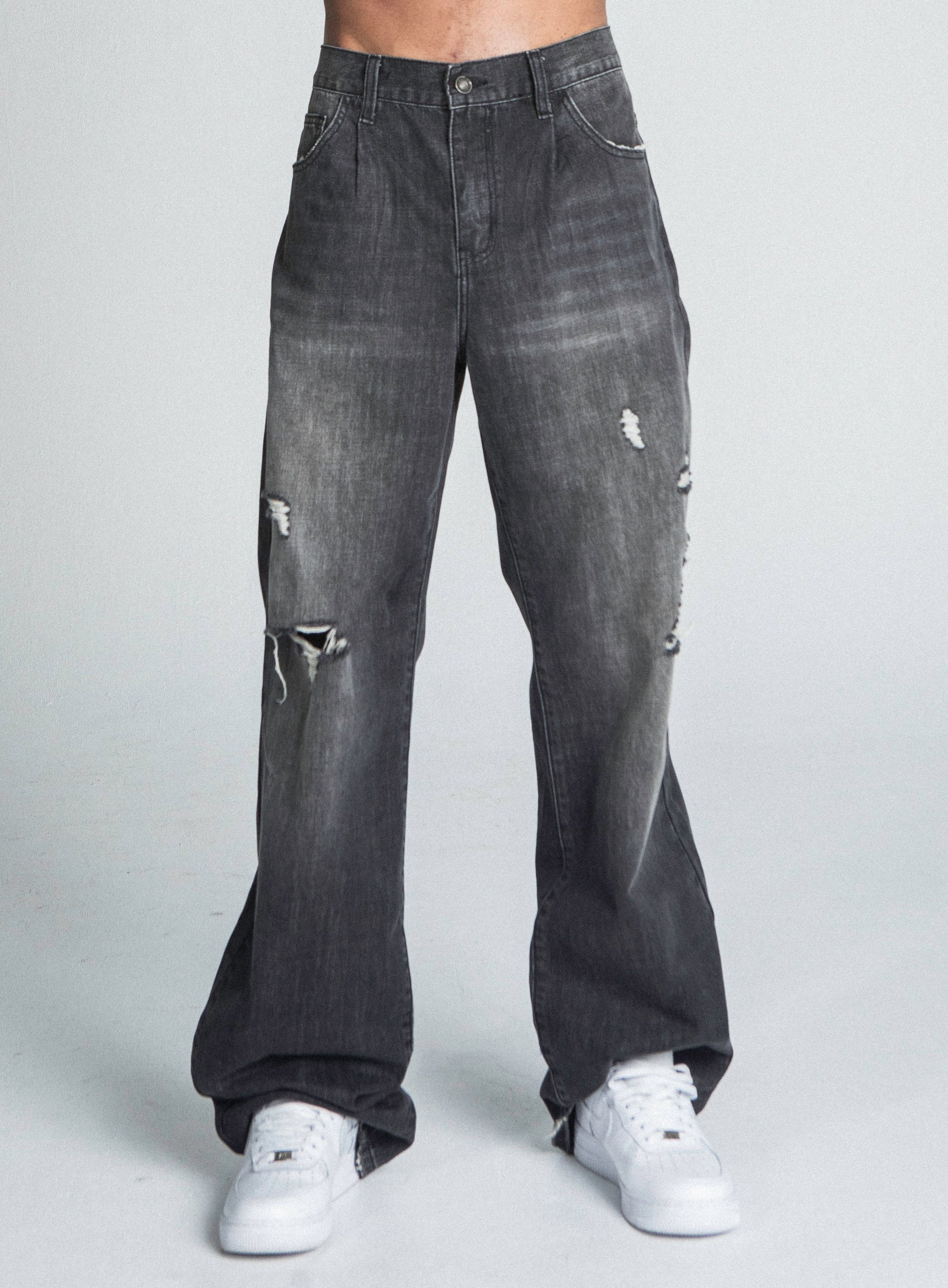 AJ09B-2 BLACK DISTRESSED BAGGY JEANS with mid-rise, loose-fit, faded details, and five-pocket design made from cotton.