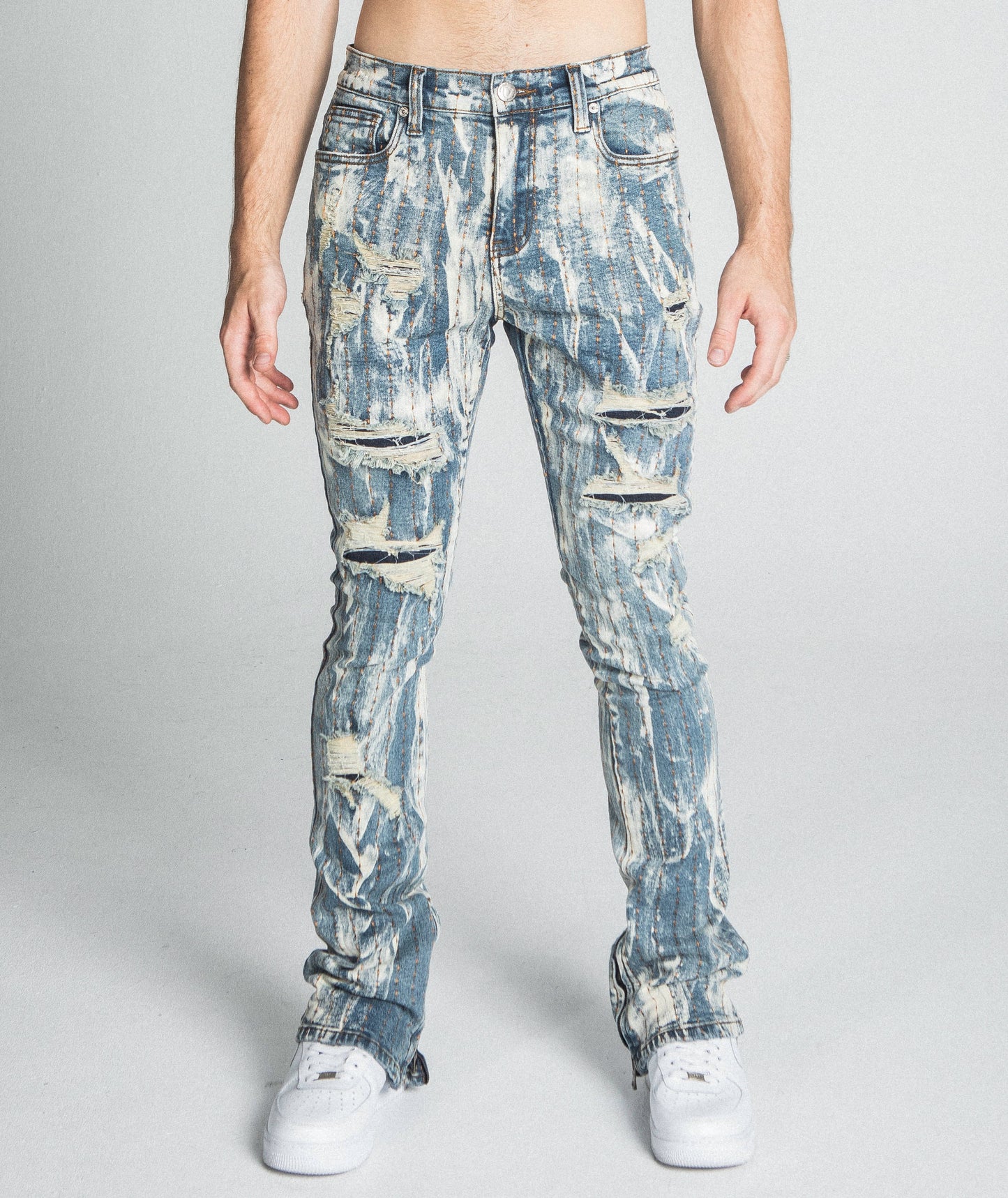 AJ17SK THREAD LINE STACKED JEANS with vintage wash, mid-rise waist, stretchy fabric, five-pocket design, and zipper fly.
