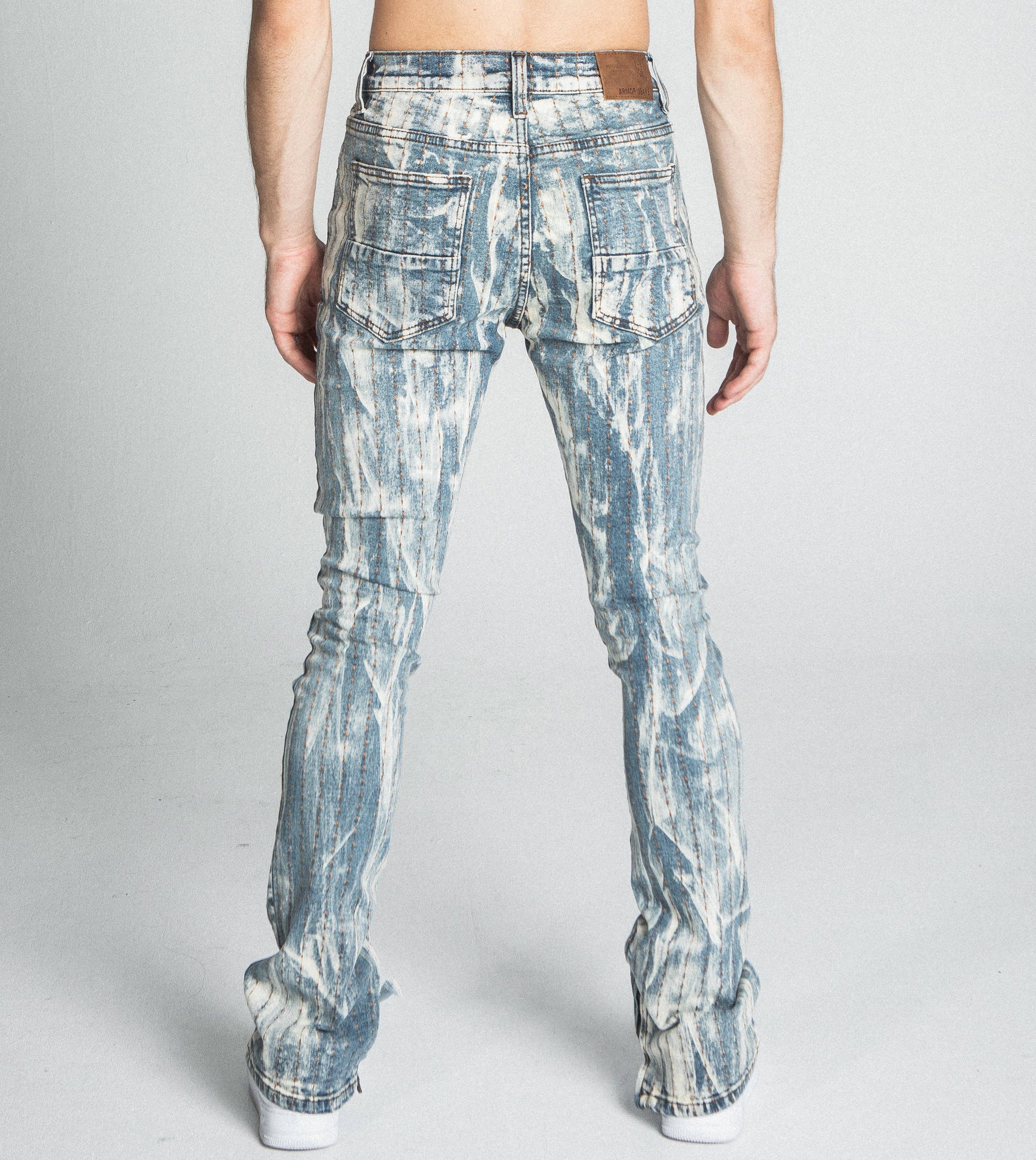 AJ17SK THREAD LINE STACKED JEANS back view showing vintage wash and stretchy fabric