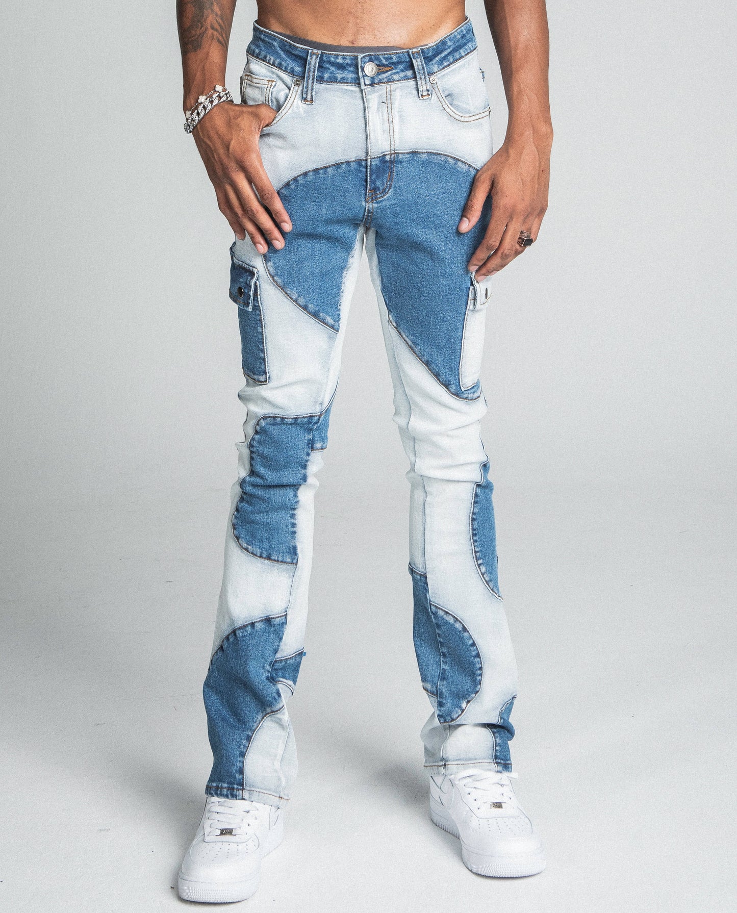 AJ40SK COLOR BLOCK STACKED JEANS with mid-rise waist, stretchy cotton, color block design, belt loops, and zipper fly button fastening.