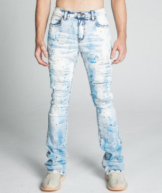 AJ28SK LIGHT BLUE/WHITE PAINT STACKED JEANS with mid-rise waist and five-pocket design, featuring stretchy cotton fabric.