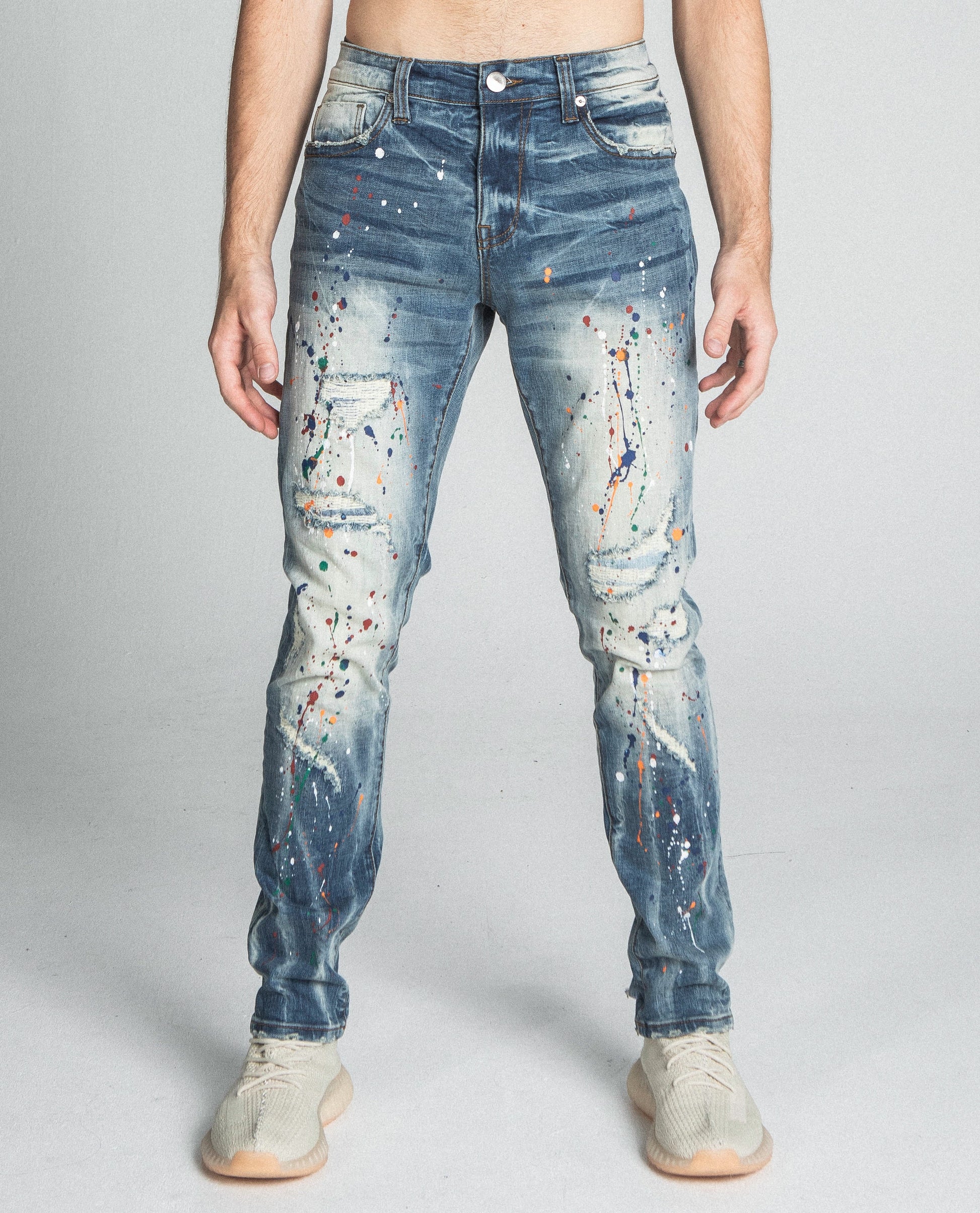 AJ738SL-1 SPLASH PAINT VINTAGE SLIM JEANS with mid-rise waist and stretchy, ripped slim leg design, featuring five pockets and zipper.