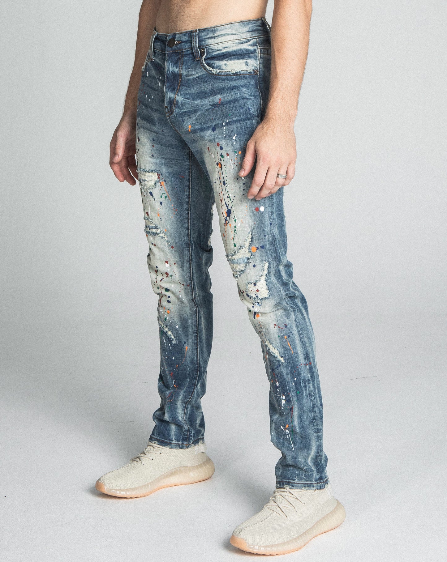 AJ738SL-1 SPLASH PAINT VINTAGE SLIM JEANS with stretchy fabric and mid-rise waist in a five-pocket design.