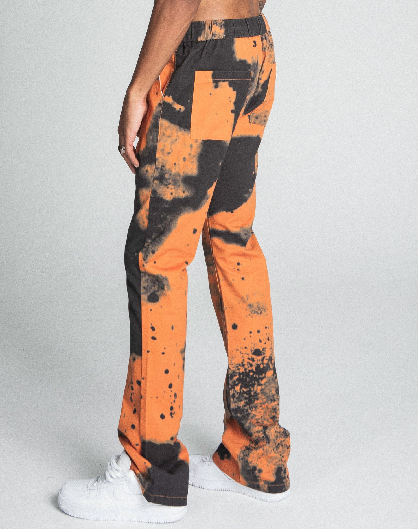 AJ04SK COLOR DYE STACKED JEANS in orange, featuring non-stretch mid-rise straight-leg design with color dye detail and elastic waistband.