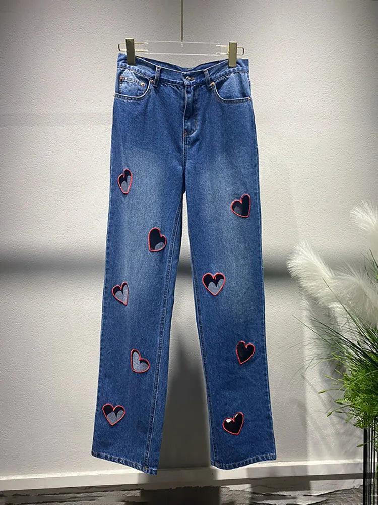 Heart Cutout Wide Leg Jeans | Romantic Wear for Women with heart-shaped cutouts, showcased in a stylish display.