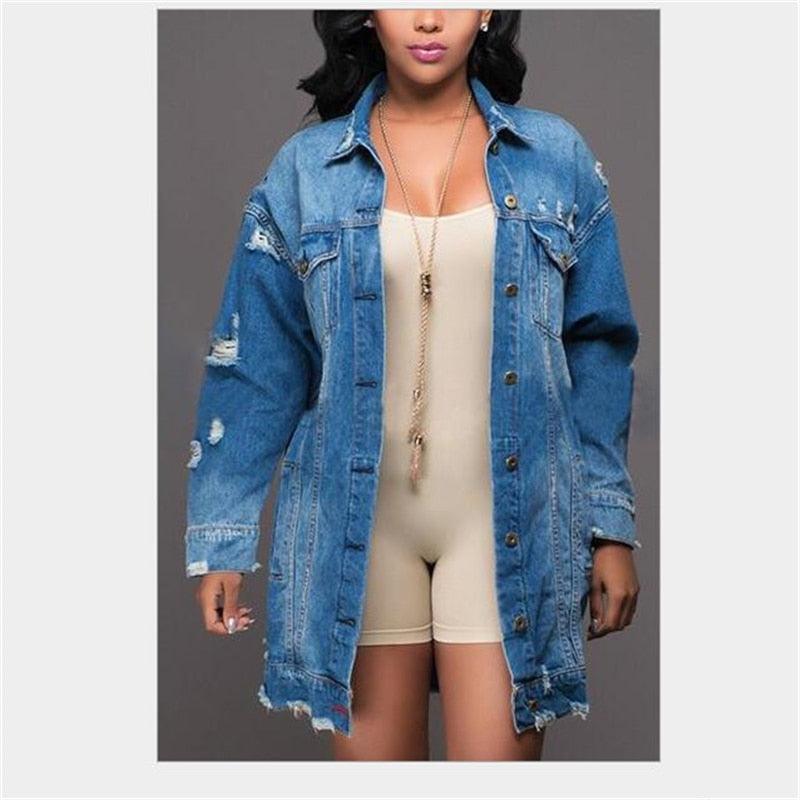 Woman wearing Cowgirl Chic Boyfriend Denim Jacket | Distressed & Stylish Western Outerwear with long sleeves and distressed details.