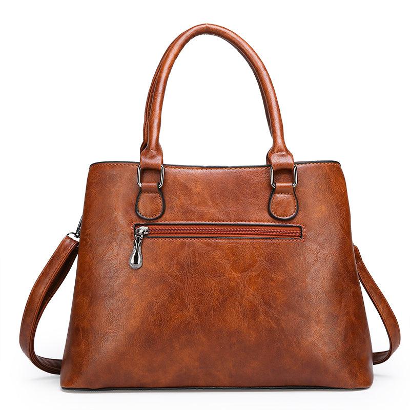 Luxury 3 Piece Leather Tote Set | Genuine Leather Cowgirl Shoulder Bag & Clutch in brown with silver-plated accents.