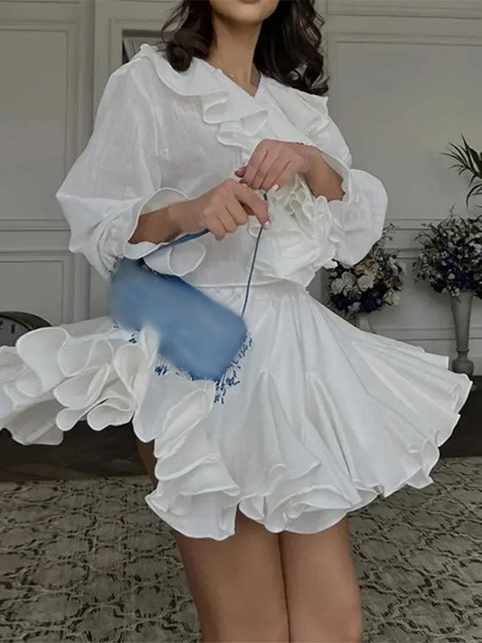 Vintage Pleated Ruffled Mini Skirt | Country Girl Festival & Rodeo Skirt on model, highlighting pleated and ruffled details in white.