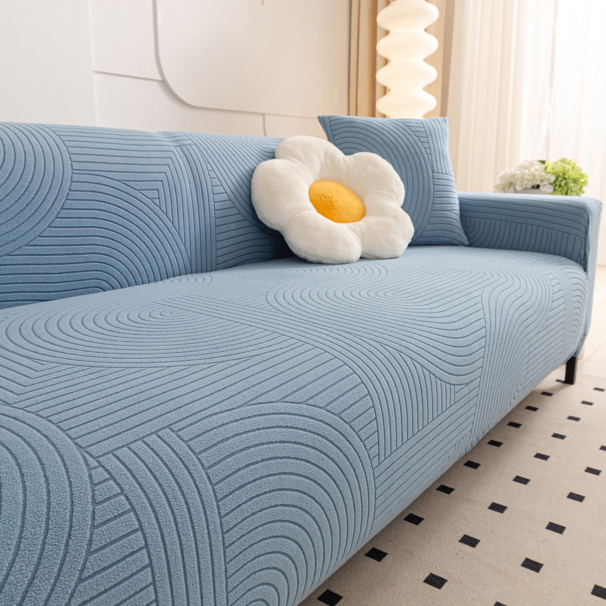 Fleece Stretch Sofa Slipcover Washable Soft Spandex Couch Cover Furniture Protector with blue geometric wave pattern.