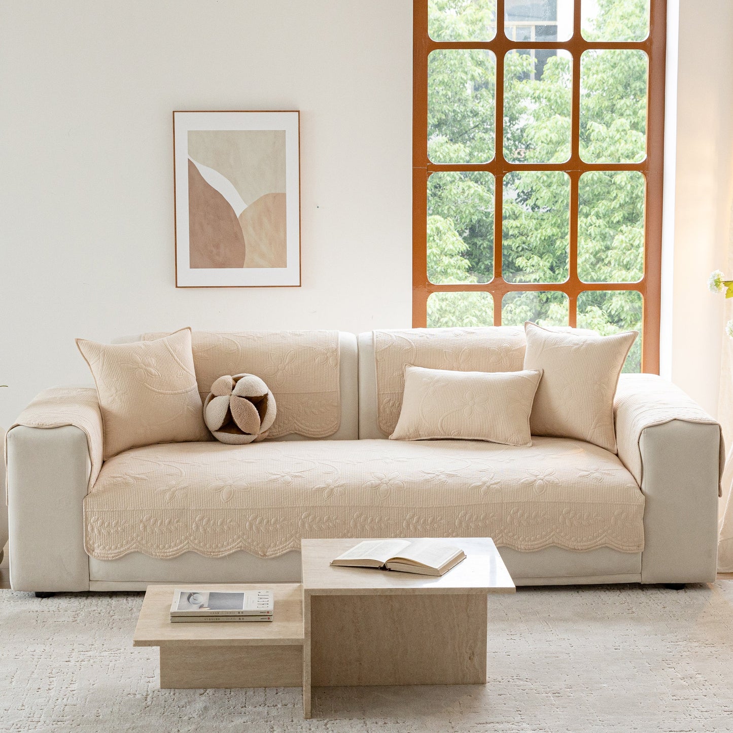 Floral Cotton Quilted Sofa Cover, Non-Slip Couch Protector with Scalloped Edges in living room setting