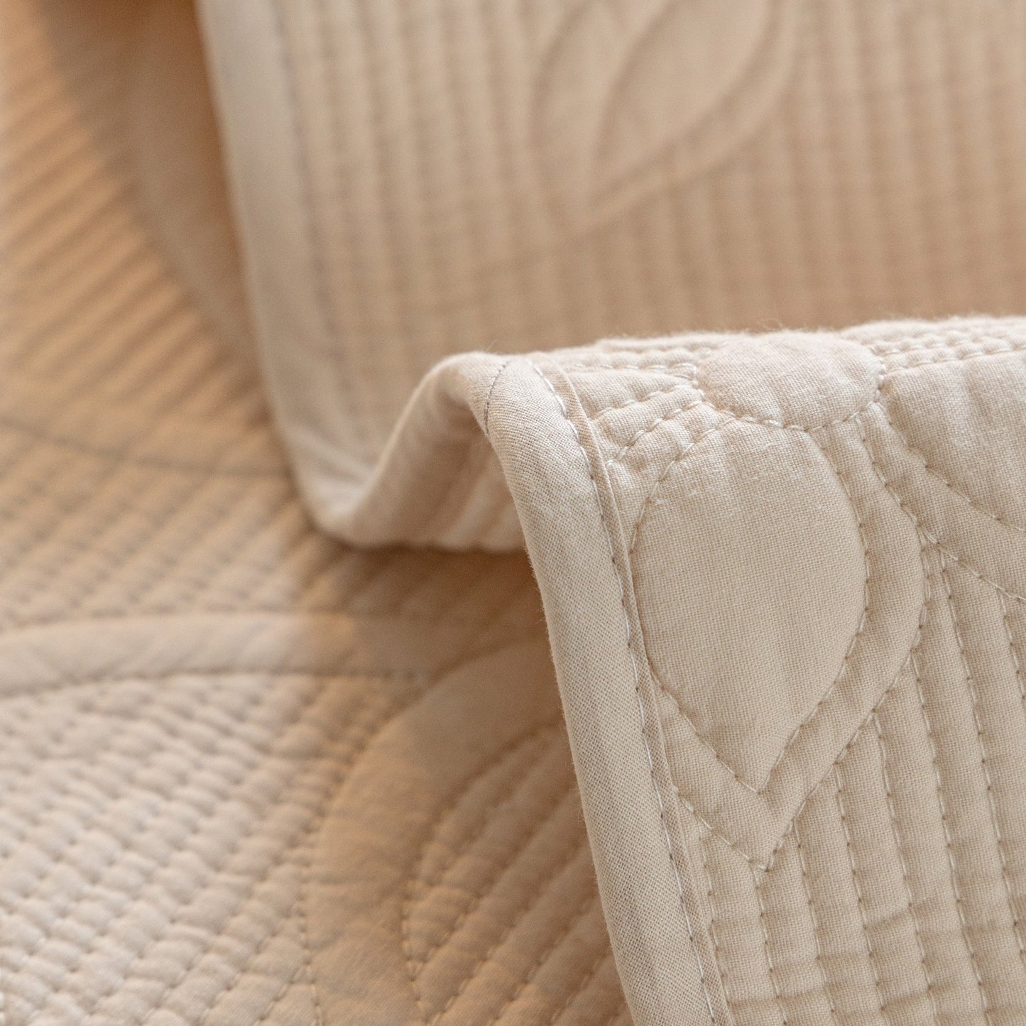 Floral Cotton Quilted Sofa Cover, Non-Slip Couch Protector with Scalloped Edges in beige embroidery detail