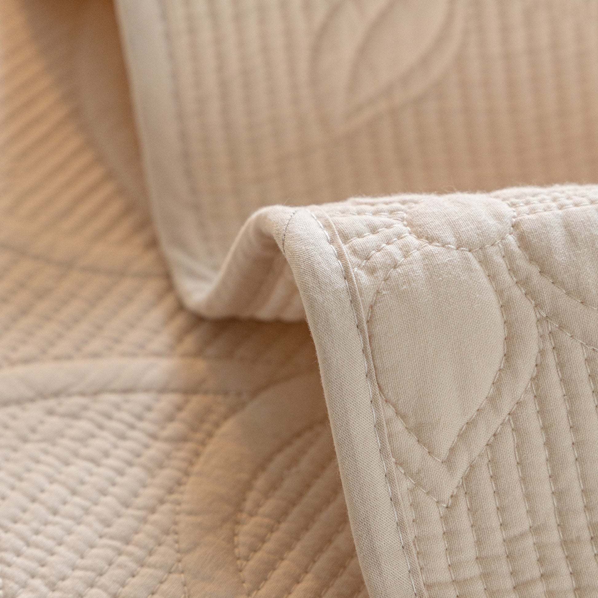 Floral Cotton Quilted Sofa Cover, Non-Slip Couch Protector with Scalloped Edges in beige embroidery detail