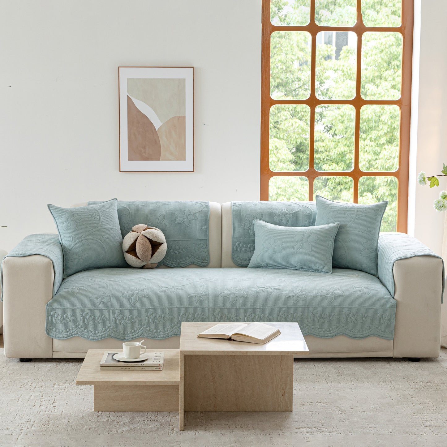 Floral Cotton Quilted Sofa Cover, Non-Slip Couch Protector with Scalloped Edges, elegant blue cover on white couch