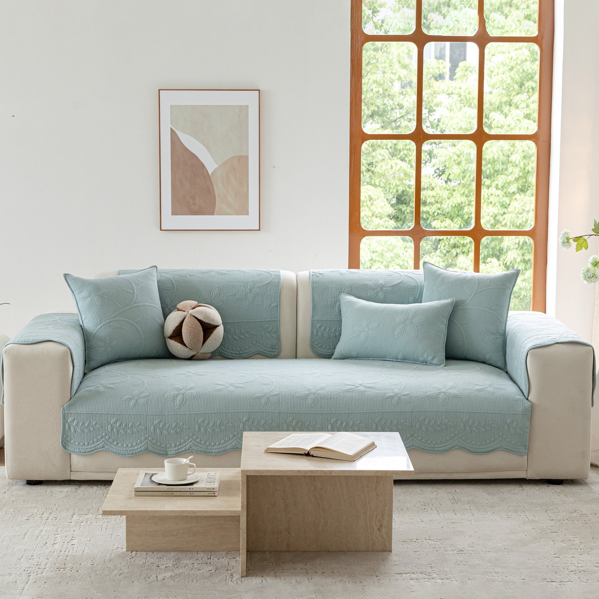 Floral Cotton Quilted Sofa Cover, Non-Slip Couch Protector with Scalloped Edges, elegant blue cover on white couch