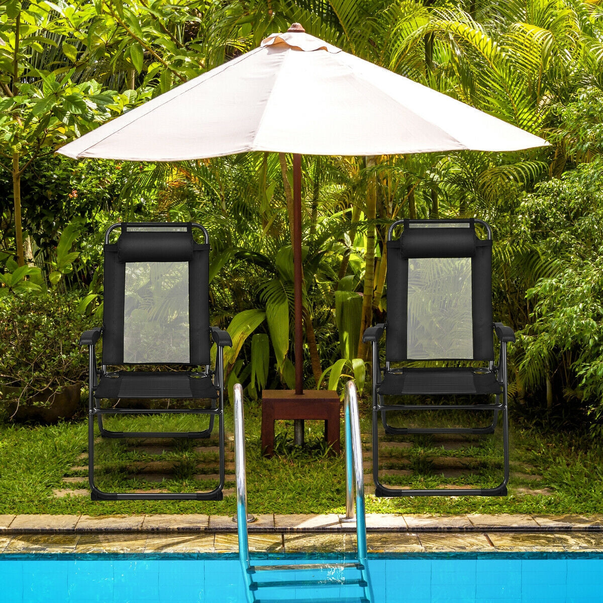 4 Pieces Patio Garden Adjustable Reclining Folding Chairs with Headrest-Black by a pool with umbrella
