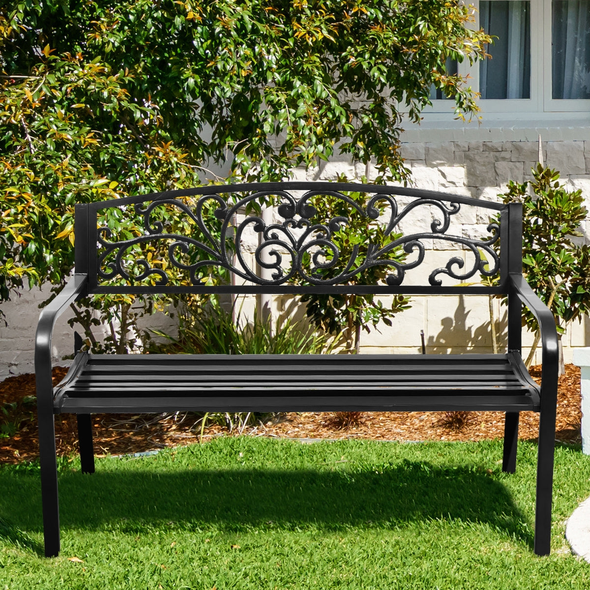 50 Inch Patio Park Steel Frame Cast Iron Backrest Bench Porch Chair on grass with ornate design