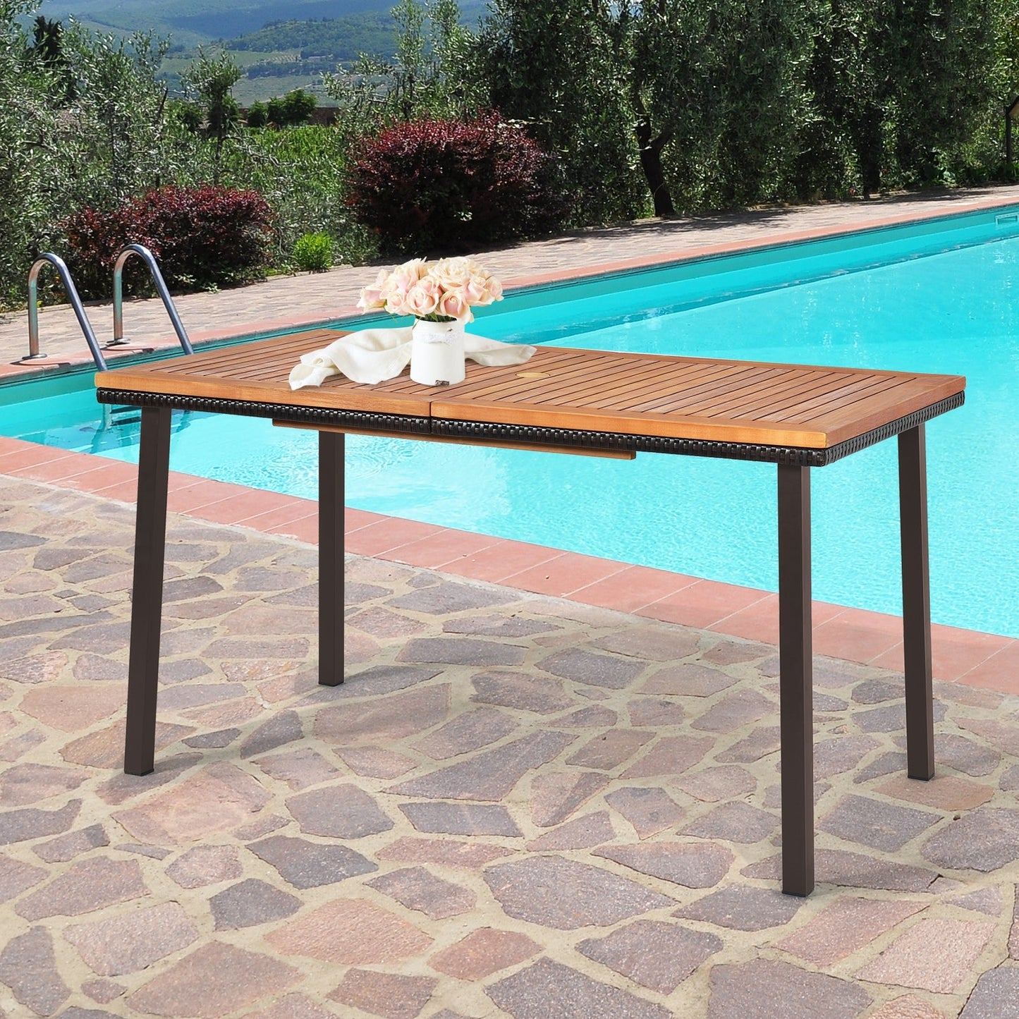 55 Inch Patio Acacia Dining Table with Umbrella Hole by a pool, featuring acacia wood and rust-proof legs.