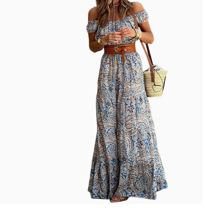 Woman wearing Prairie Blossom Off-Shoulder Maxi Dress with floral print and accessories