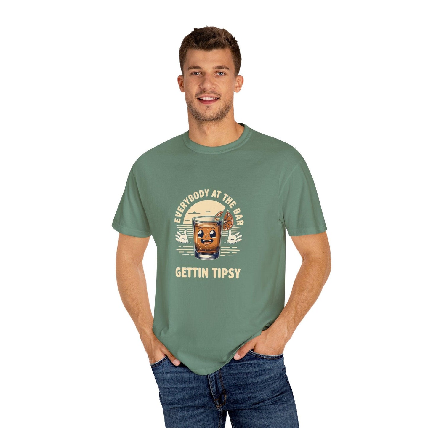 Model wearing Everybody at the Bar Gettin Tipsy Unisex Garment-Dyed T-Shirt with whiskey glass graphic