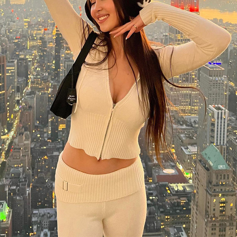 Woman wearing Long Sleeve Sweater And High Waist Long Pants Set overlooking cityscape