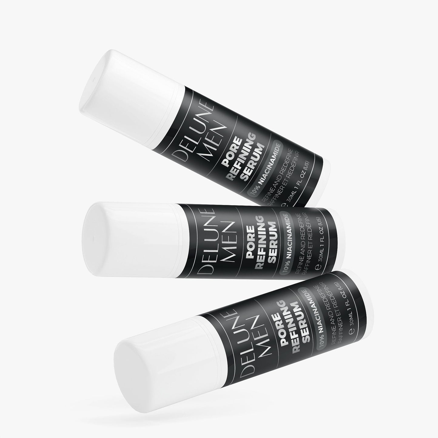 Three bottles of Pore Refining Serum with 10% Niacinamide for smoothing and refining skin texture against a light background.