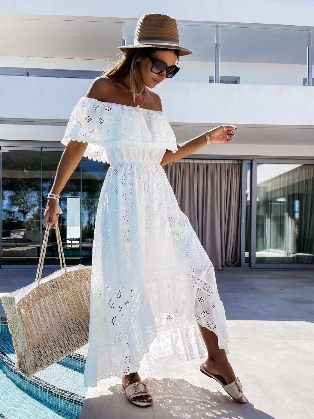 Woman wearing Bohemian Lace Princess Long Dress by a poolside, accessorized with a sun hat and tote bag, highlighting summer style.