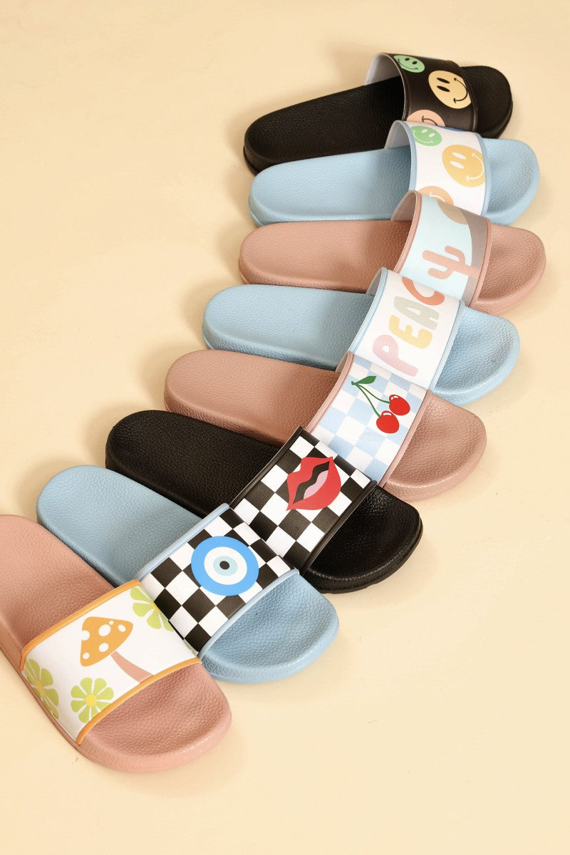 Miss Sparkling novelty printed slides in various colors and designs including checkerboard and fruit patterns.