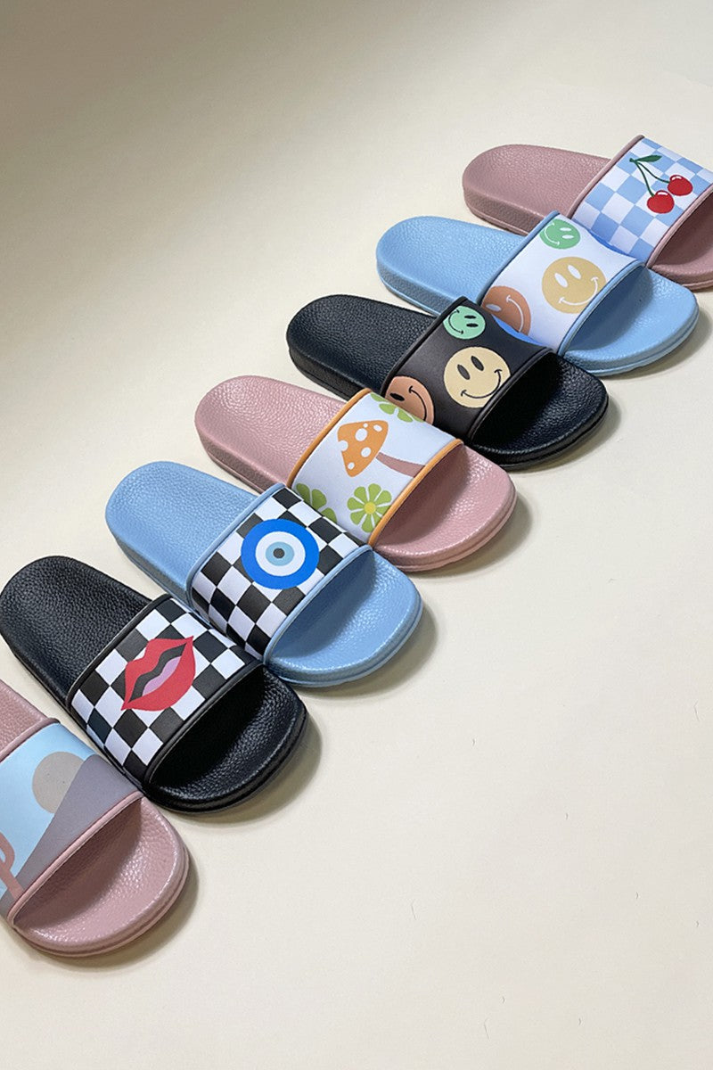 Colorful Miss Sparkling novelty printed slides in various designs and sizes on display.
