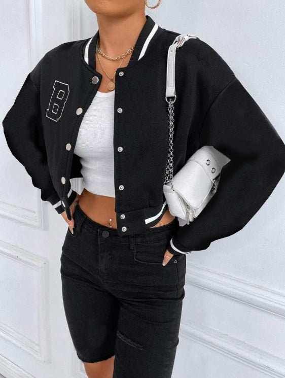 Model wearing Women's Printed Baseball Collar Jacket – Casual Streetwear with white top and black jeans.