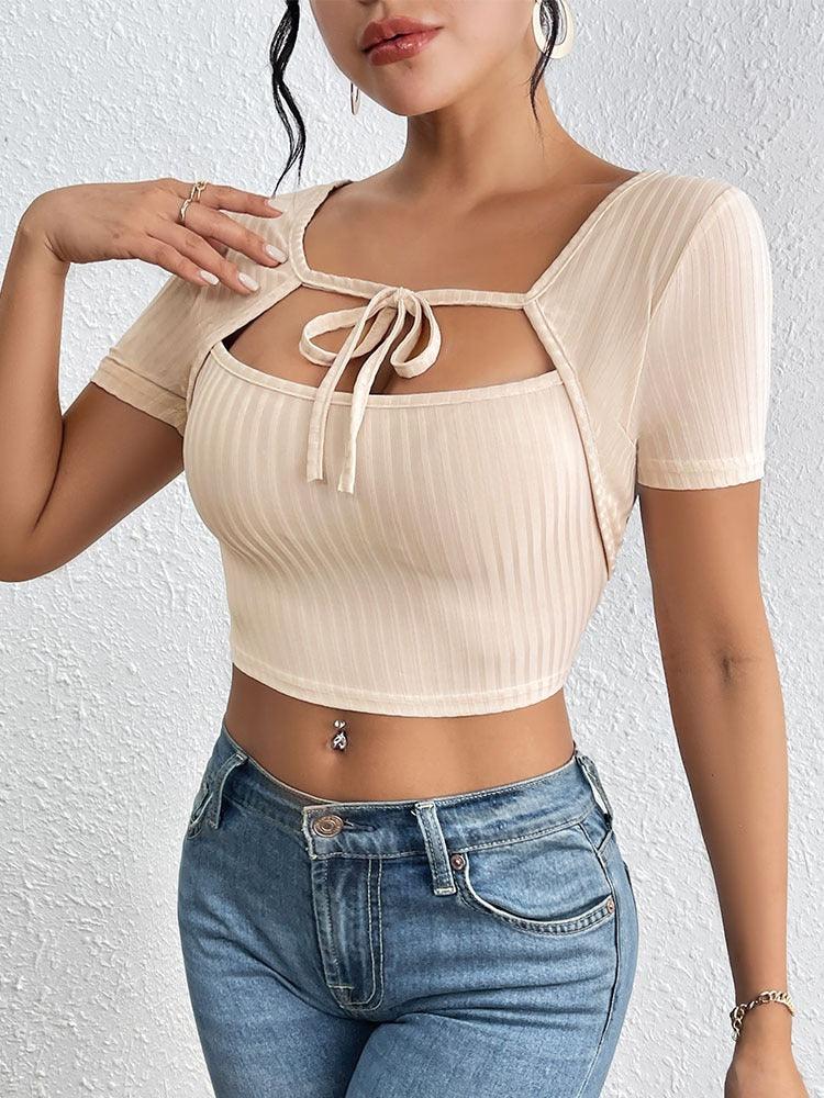 Silky Textured Crop Top – Chic Asymmetrical Collar Top for Casual & Formal Wear in apricot, modeled by woman in jeans.