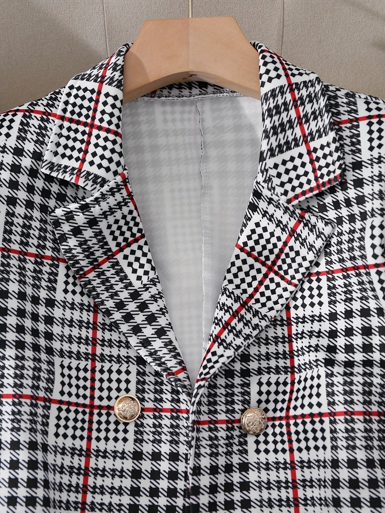 Close-up of blazer from Plus Size Plaid Skirt Suit for Women – Two-Piece Blazer and High Waist Skirt Set, featuring a black and white plaid pattern