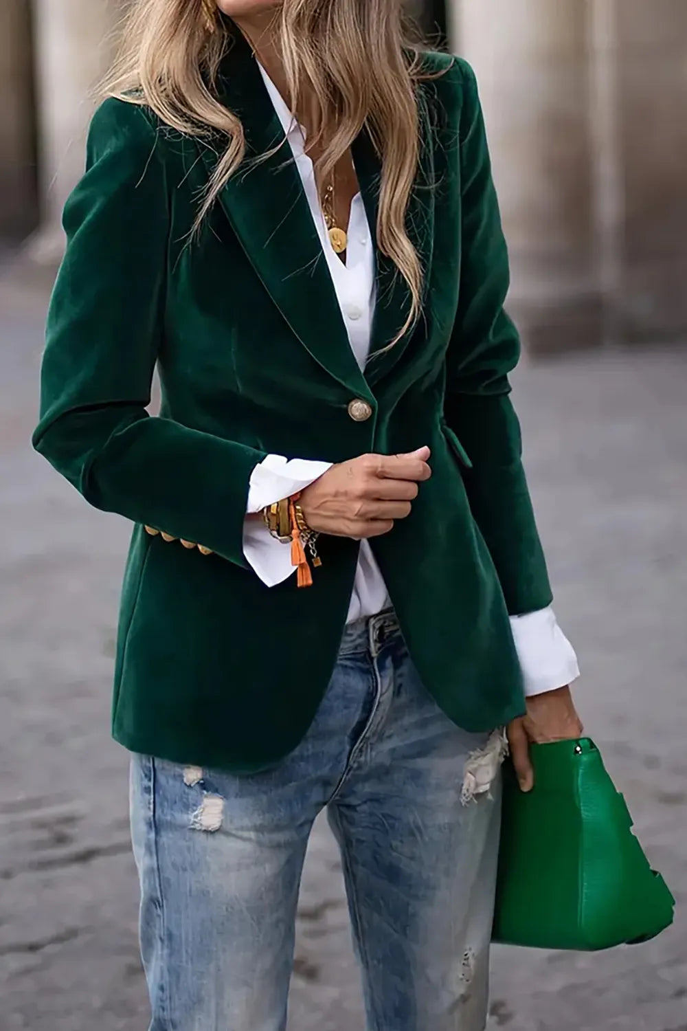 Woman wearing One-Button Lapel Collar Long Sleeve Blazer for Women with jeans, holding a green purse