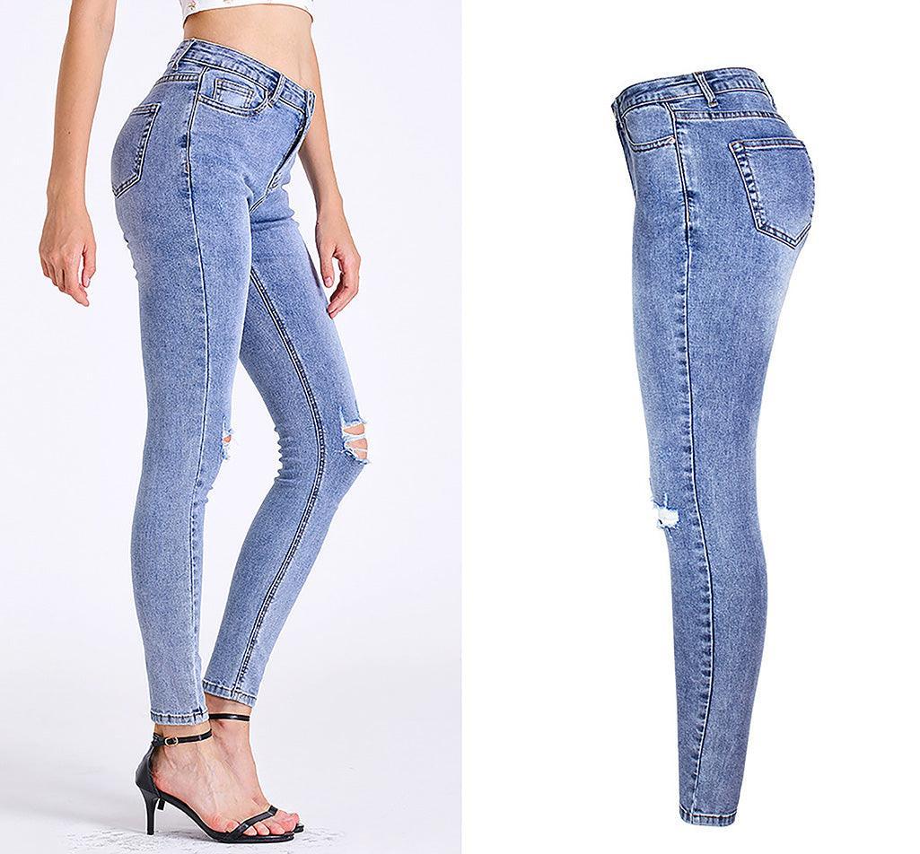 Essential Ripped Skinny Jeans – Stretch Slim Fit, Stone Wash Blue Denim, Street Style with distressed knees displayed on a model.