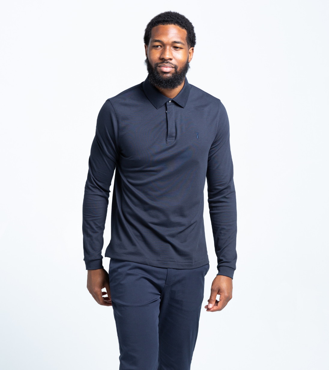 Man wearing Baobab Long Sleeve Perfect Polo with crisp StaySharp™ Collar, showcasing modern tailored fit and effortless performance.
