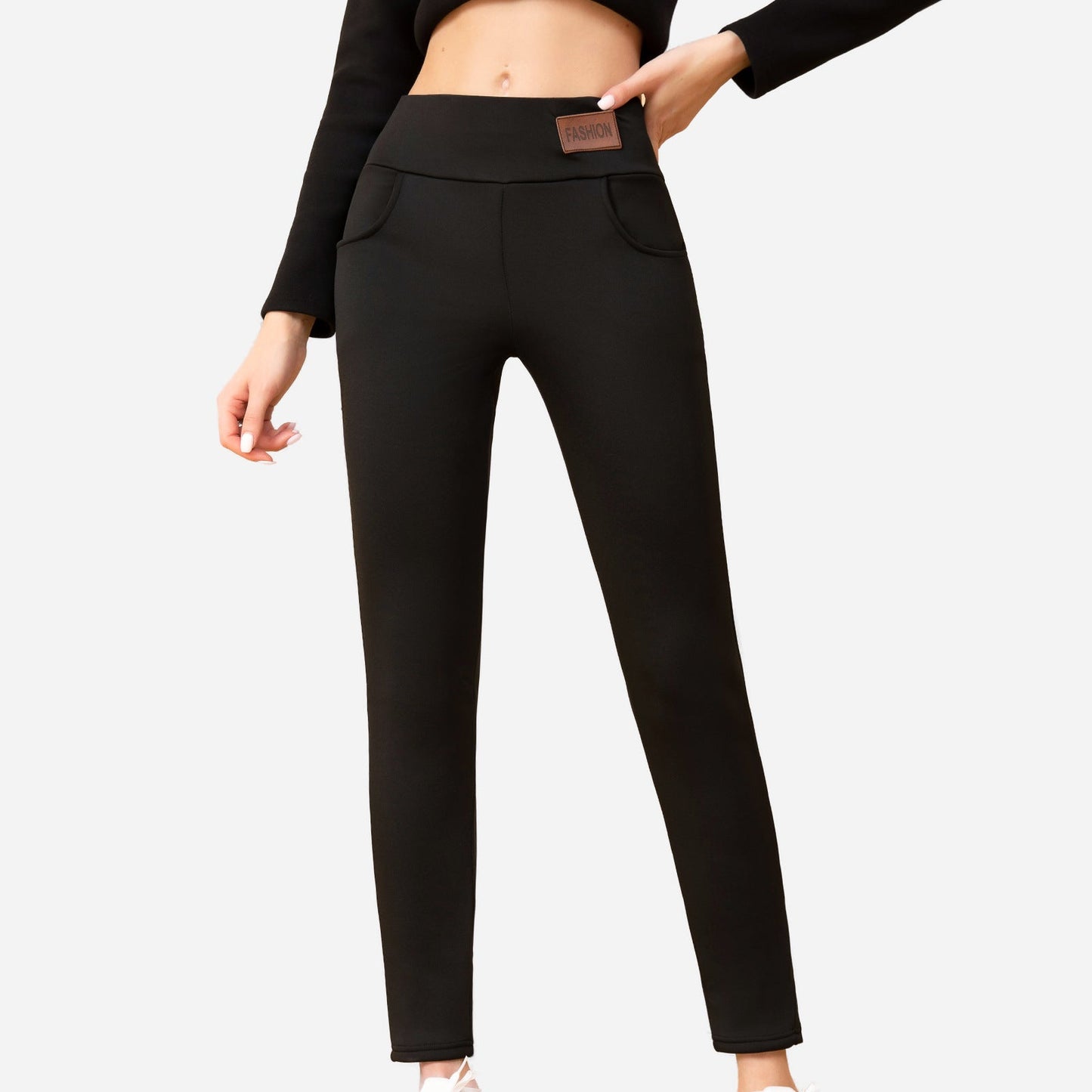 Woman wearing High Slit Casual Pants with Side Slit Detail | Fitiquefit in black, showcasing the stylish side-slit feature.