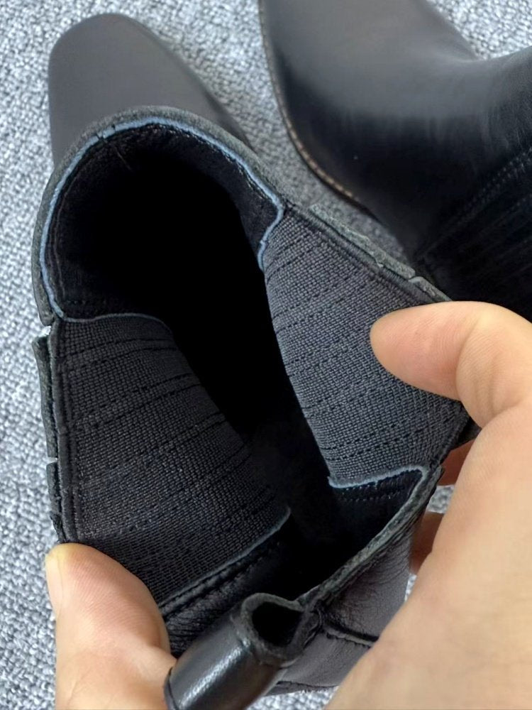 Close-up view of Women’s Retro Square-Toe Mid-Heel Chunky Leather Boots interior, showcasing elastic and leather detail.