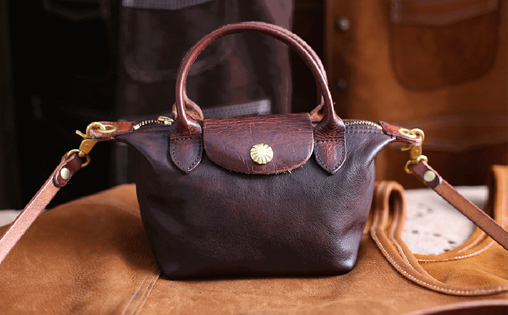 Vintage Luxe Horse Skin Leather Handbag with antique silver-tone hardware showcasing rugged charm and timeless elegance.