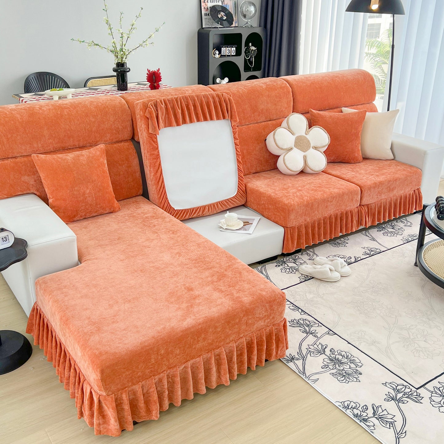 Universal Elastic Skirt Sofa Slipcover on orange sectional in modern living room setting, showcasing stretch sofa cushion cover for bedroom office living room.