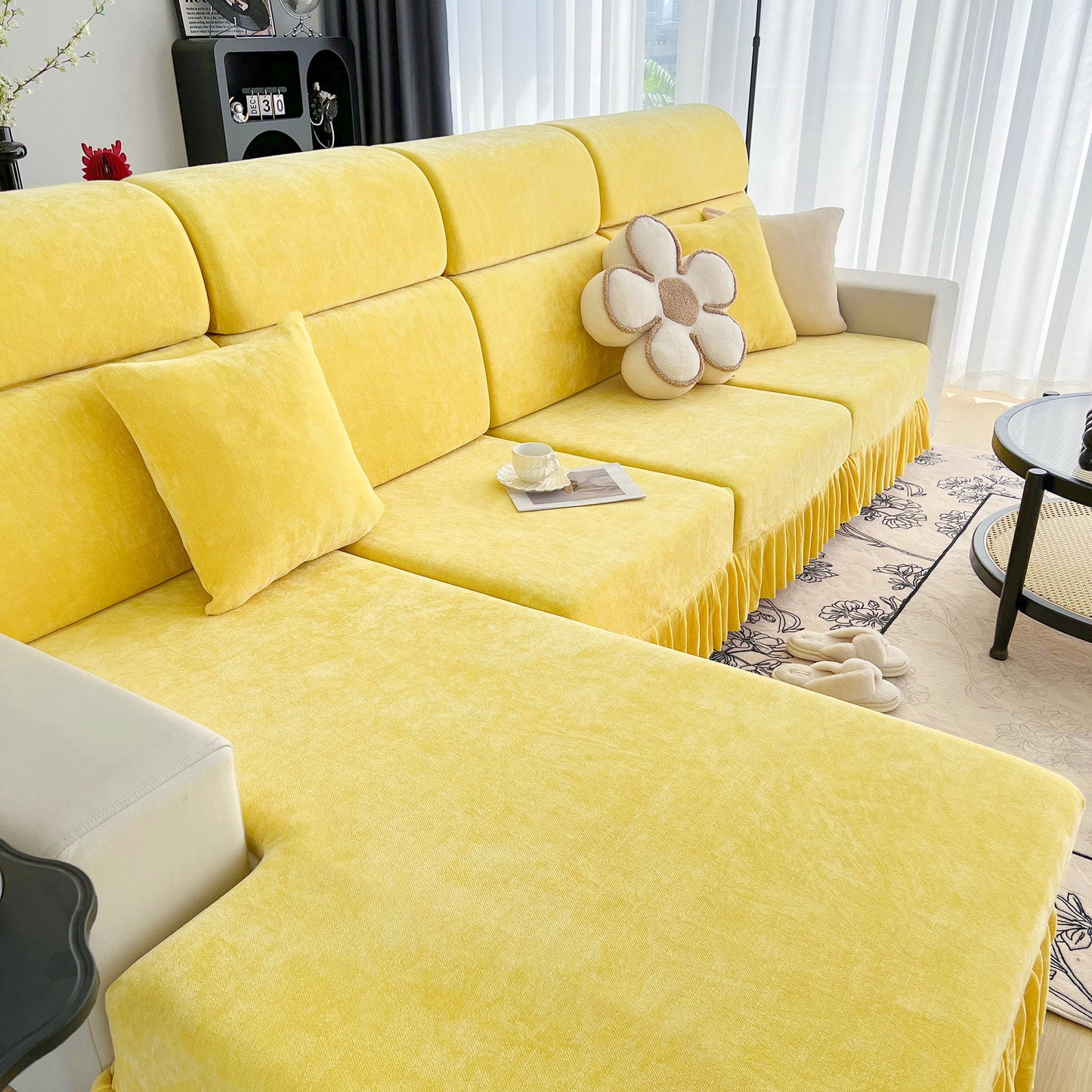 Universal Elastic Skirt Sofa Slipcover in yellow on a living room sofa, featuring stretchy fabric for stylish protection.