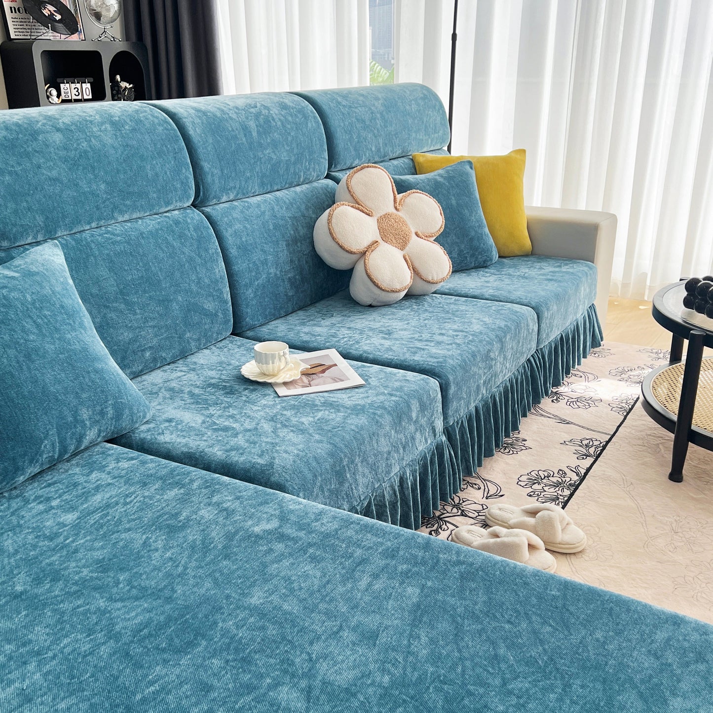 Universal Elastic Skirt Sofa Slipcover, Stretch Sofa Cushion Cover for Bedroom Office Living Room in blue on a modern sofa.
