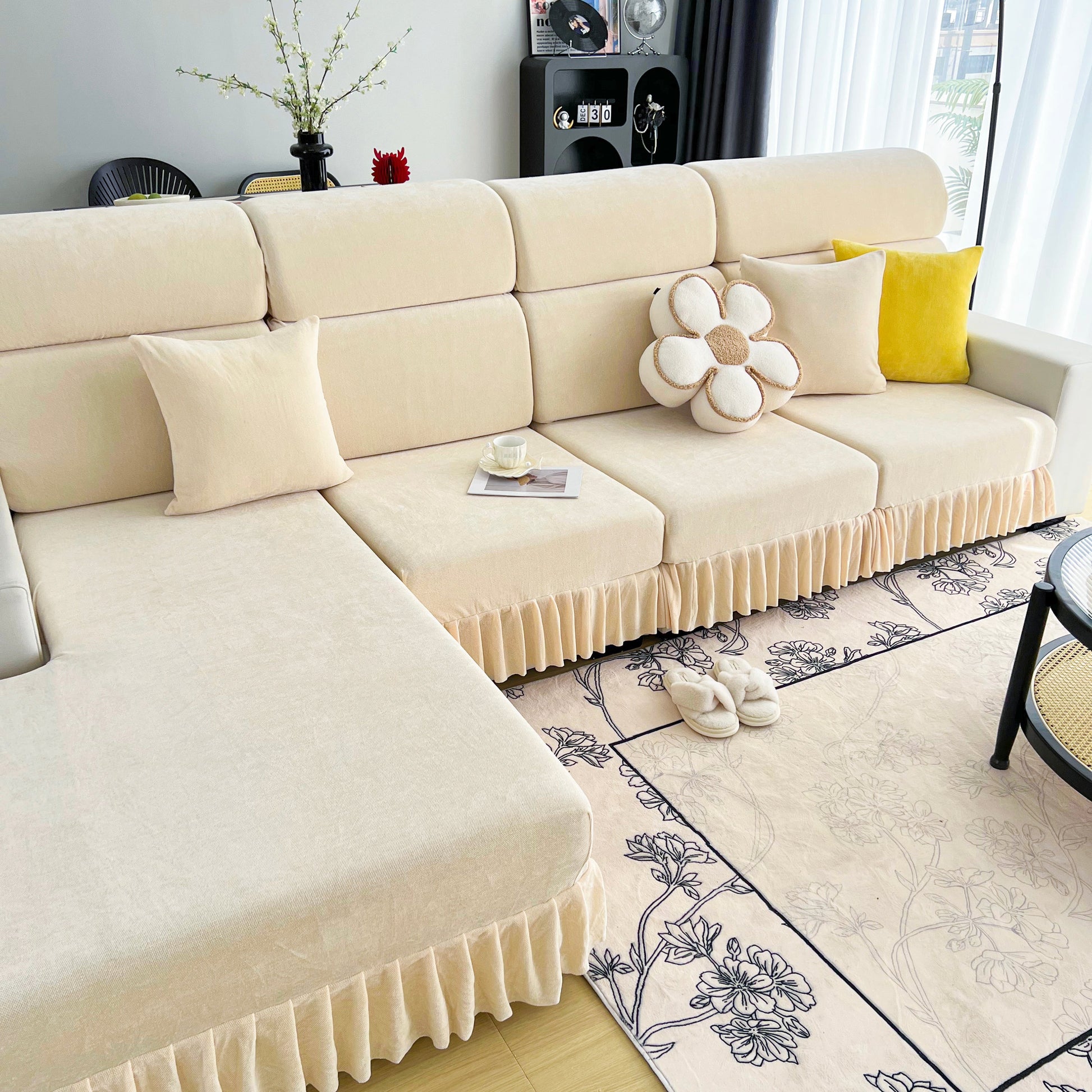 Universal Elastic Skirt Sofa Slipcover, Stretch Sofa Cushion Cover For Bedroom Office Living Room displayed on a beige sectional sofa.