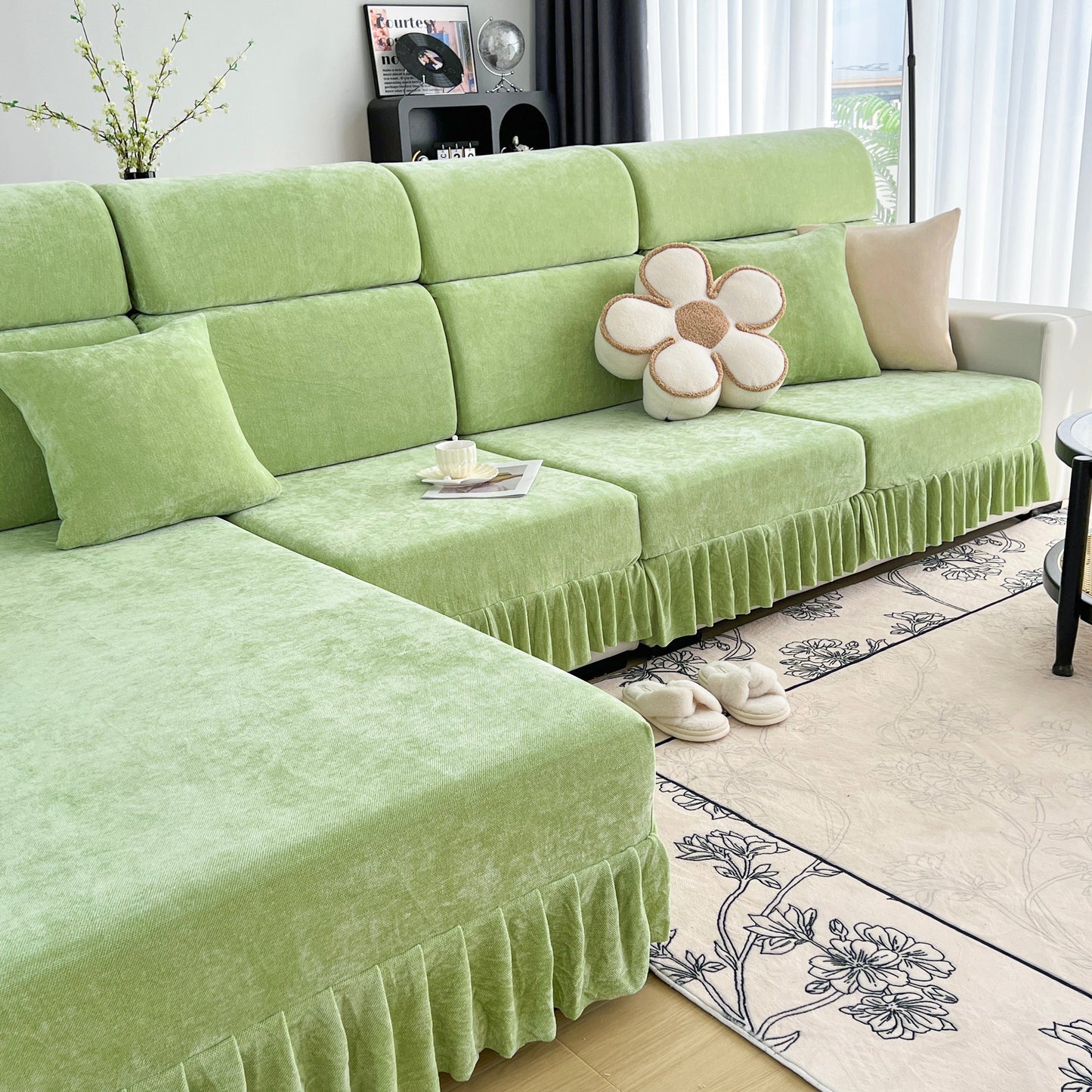 Green Universal Elastic Skirt Sofa Slipcover on modern sofa in living room, showcasing stretch sofa cushion cover for bedroom or office