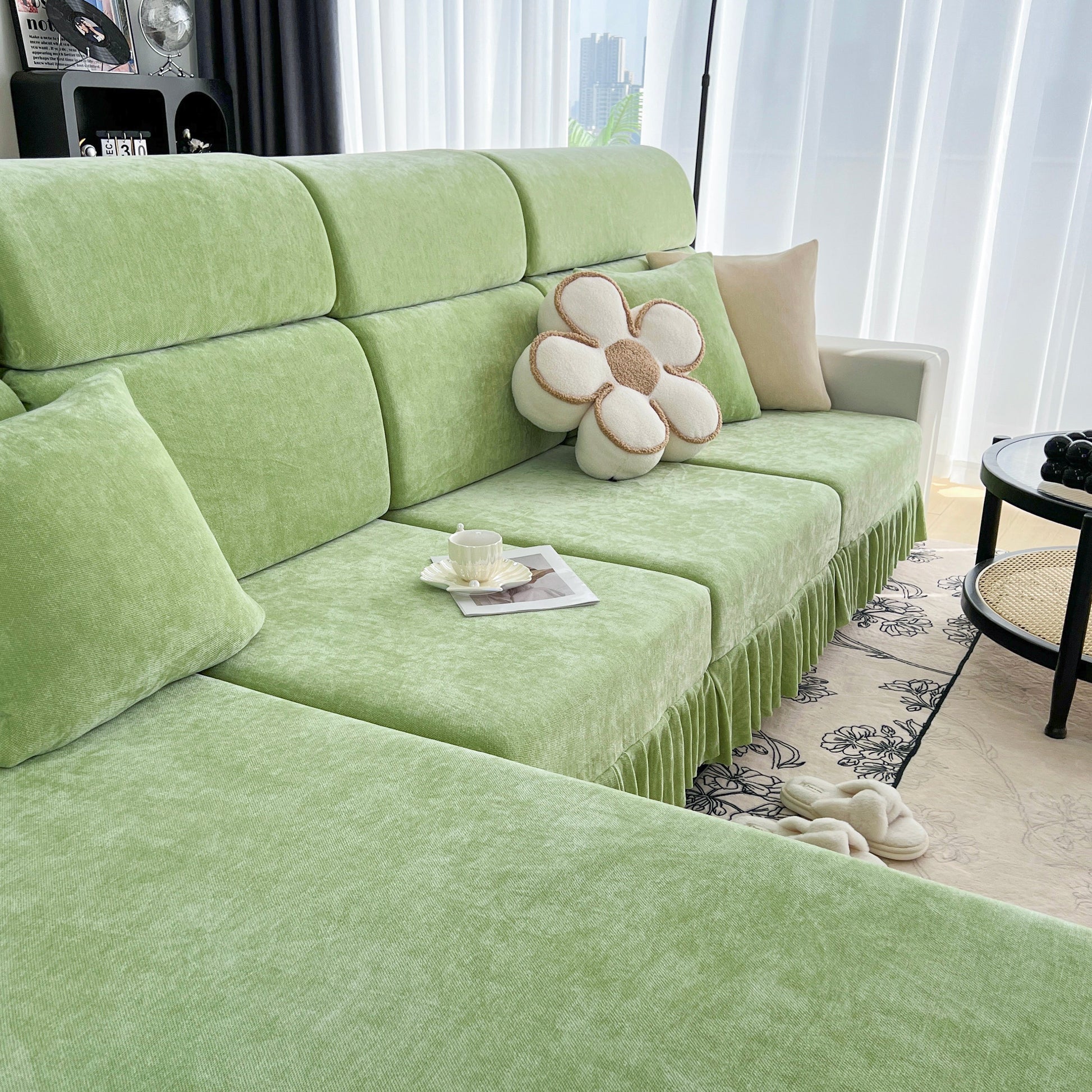 Universal Elastic Skirt Sofa Slipcover, Stretch Sofa Cushion Cover for Bedroom Office Living Room in green on a modern sofa.