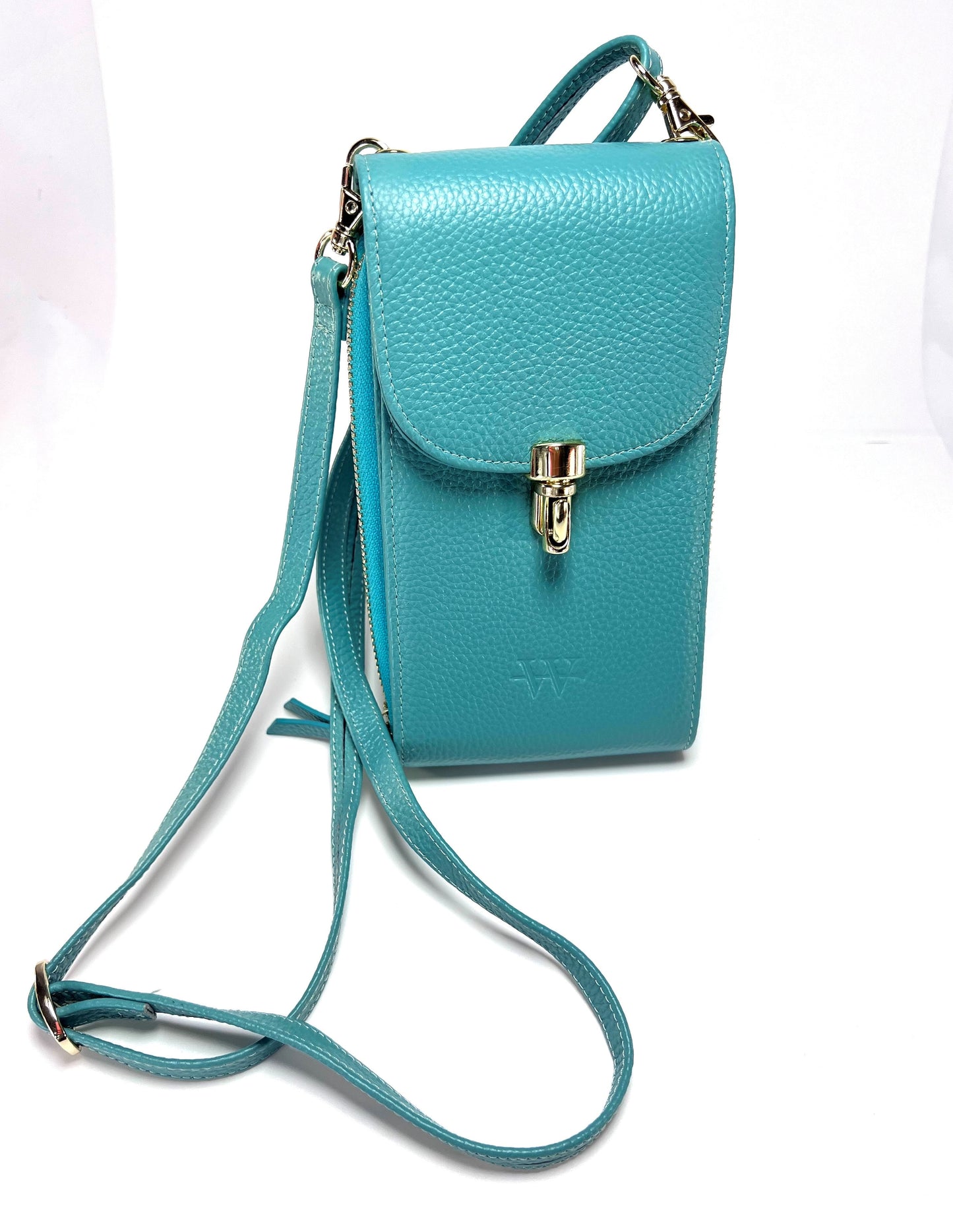 Country Club Clutches in turquoise leather with gold snap closure and adjustable strap, ideal for style and functionality on the go.