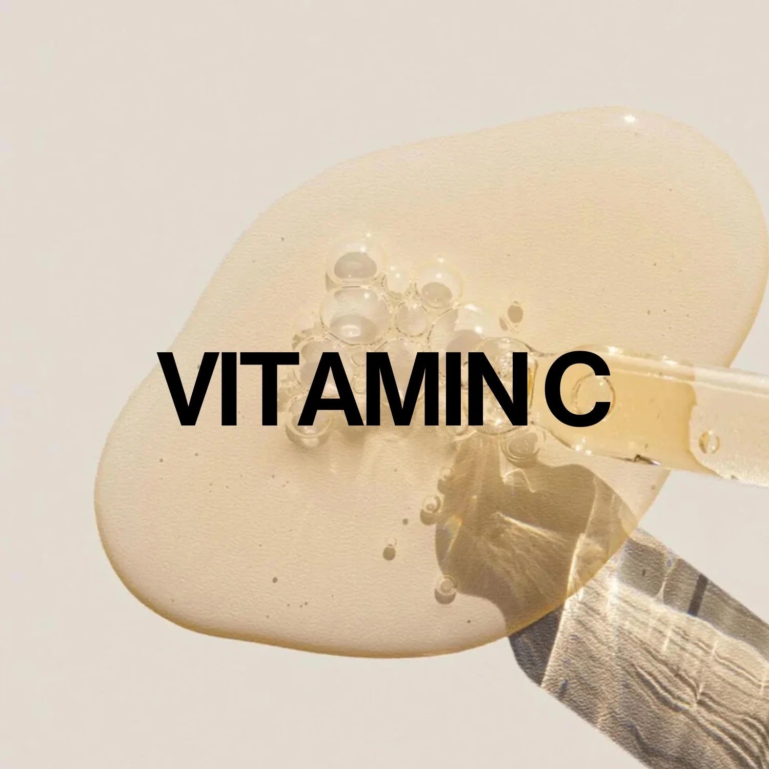 Brightening Serum (with 10% Vitamin C) - close-up texture showing rich formula with Vitamin C highlights.